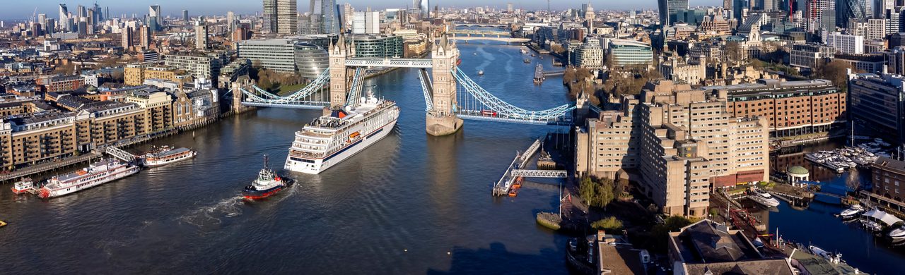 Cruise ship on the Thames passing Tower Bridge